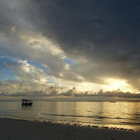Frangipani Cottages Diani Beach Exterior foto