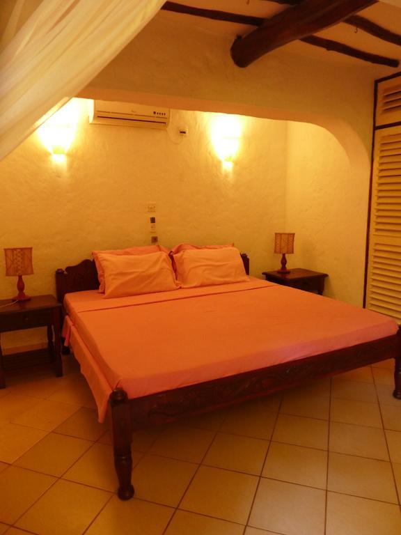 Frangipani Cottages Diani Beach Exterior foto